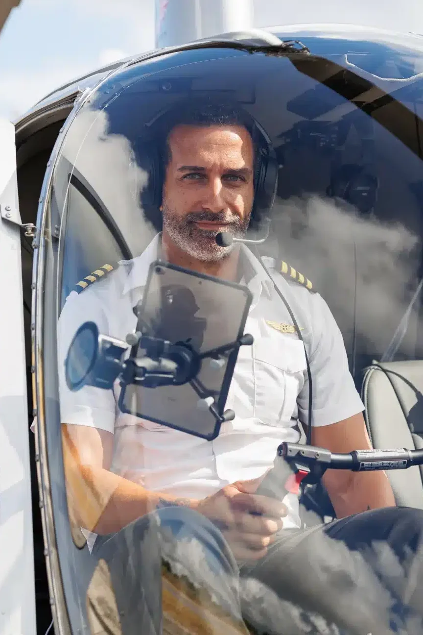 dante scarano, chief pilot, cfii, inside a robinson r44 at hill country heli's